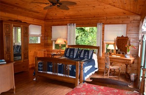 Waipio Wayside, Birds Eye Room, High cieling room, wooden walls and ceiling, ceiling fan, bed and tables